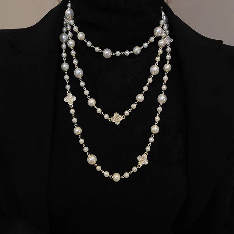 A pearl necklace suits your beauty and elegance.