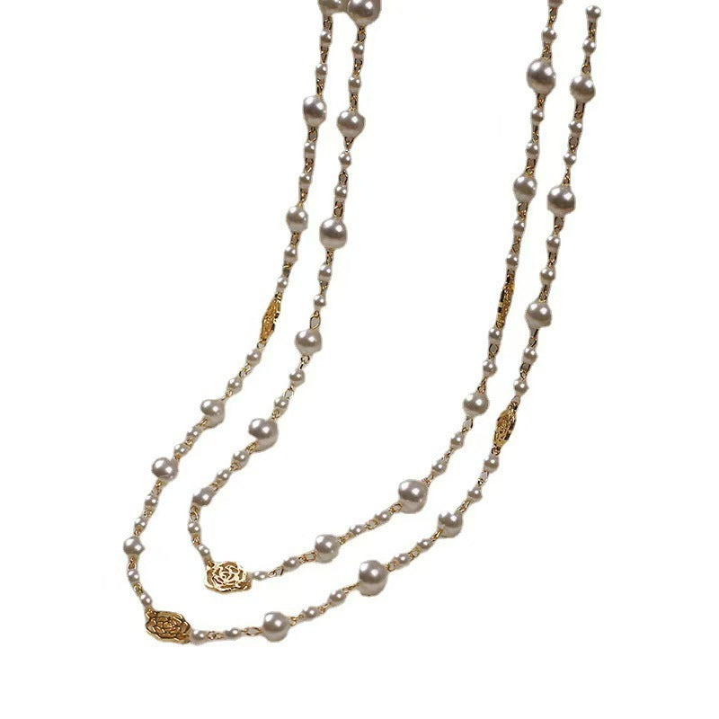 A pearl necklace suits your beauty and elegance.