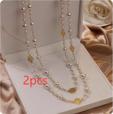 A pearl necklace suits your beauty and elegance.