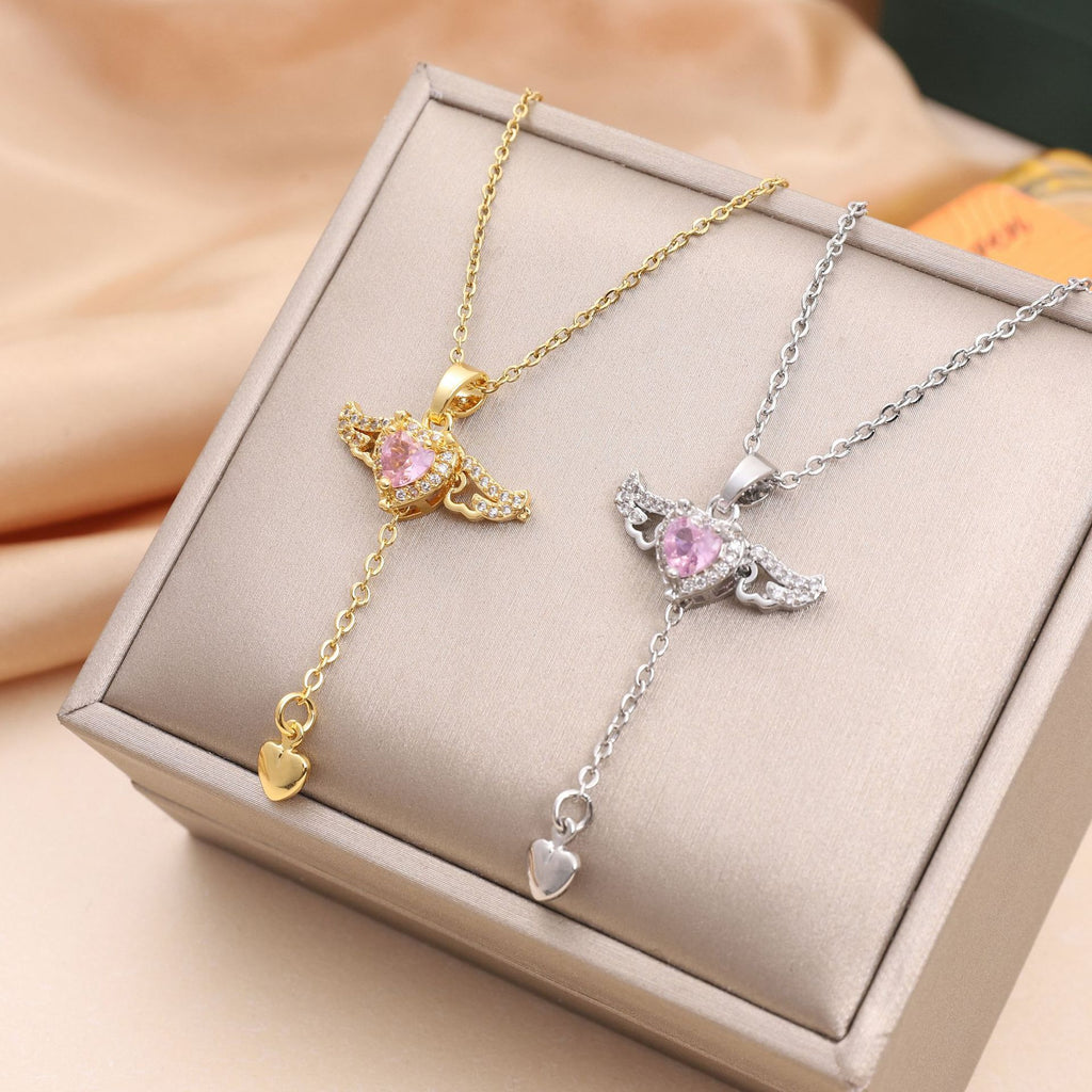 A moving pendant in the shape of a heart and wings, perfect for your innocence.