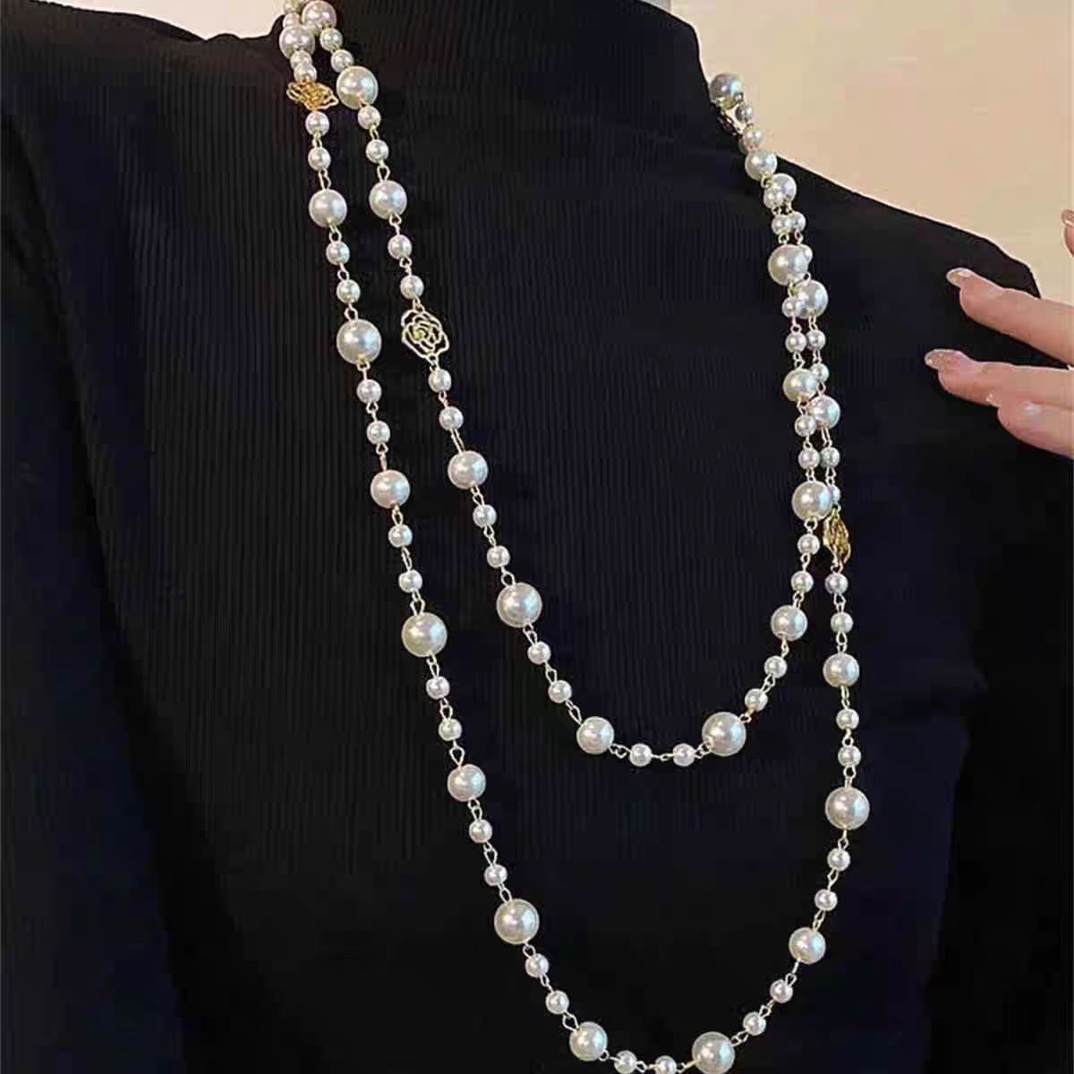 A pearl necklace suits your beauty and elegance.